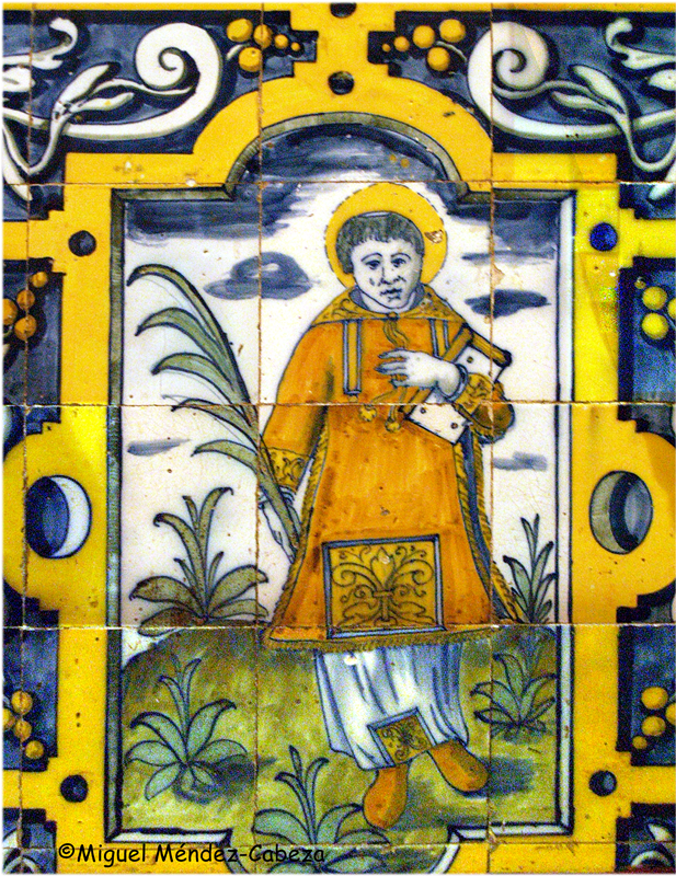 Panel de azulejos en Cabdeleda que representa a San Juan con el cáliz y el dragón